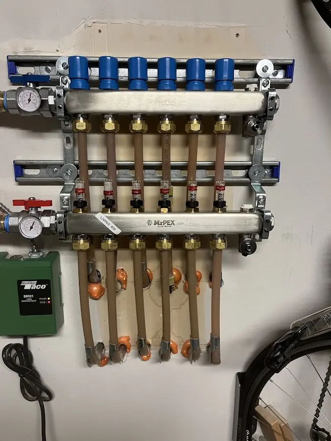 Plumber performing Gas Line Installation at a residential property in North Springfield